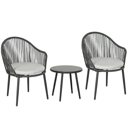 Rattan garden furniture - 2 chairs and table, cushions included