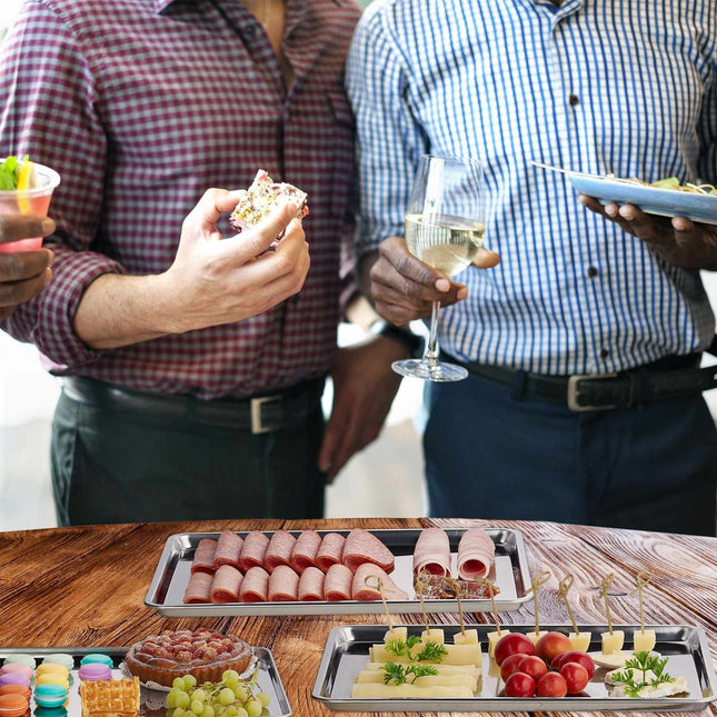 3x serving trays in steel
