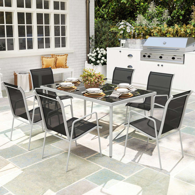 Dining room set for 6 with glass table and stackable chairs