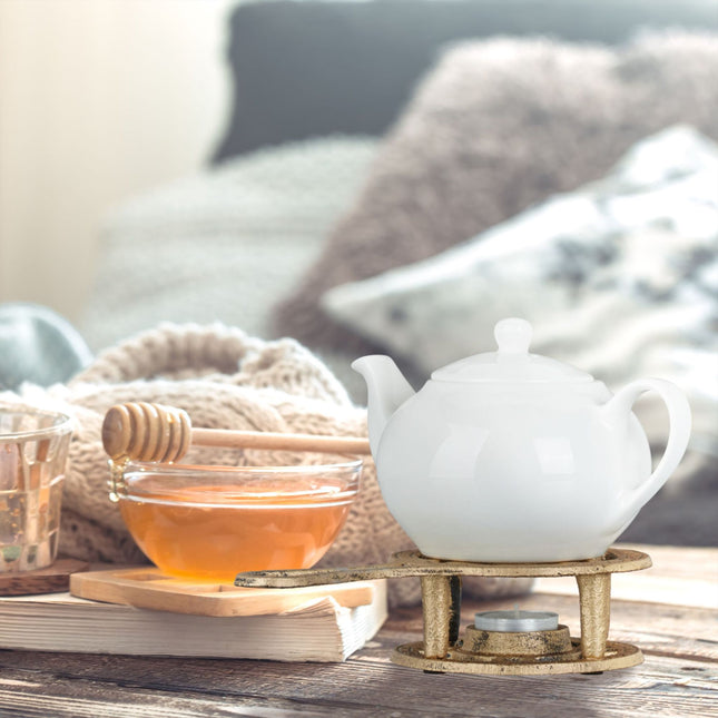 Antieke theepot in goud