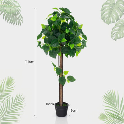 Artificial hydrangea tree in a pot with a real wooden trunk. Decorative artificial plant silk tree