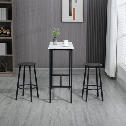 3-piece dining table set in steel with white and black stools