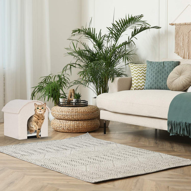 Beige cat pit with scratching surface