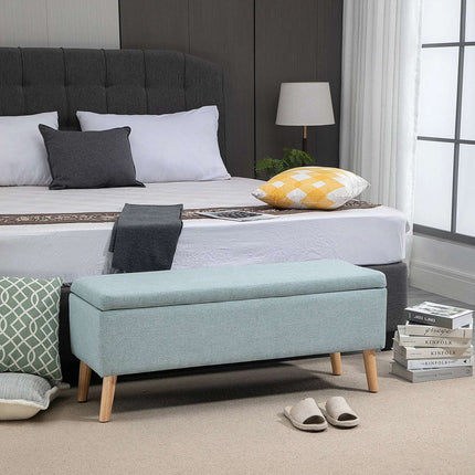 Light green upholstered bench with storage, linen-like fabric