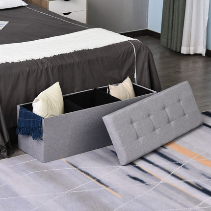 Gray upholstered storage bench, foldable with dividers