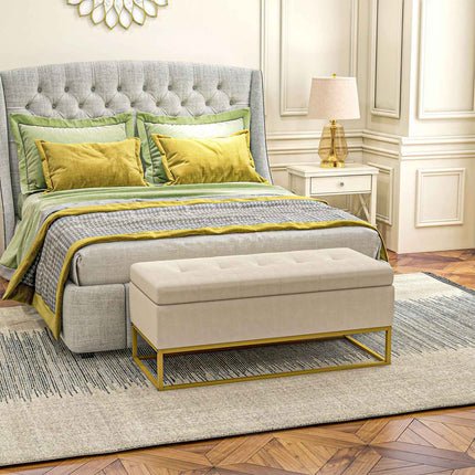 Beige upholstered storage bench with steel legs, 110cm