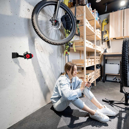 Bicycle holder for wall mounting