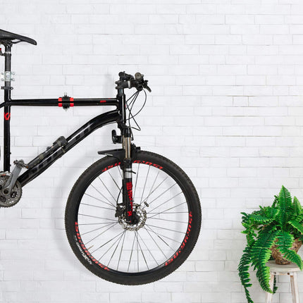 Bicycle holder for wall mounting