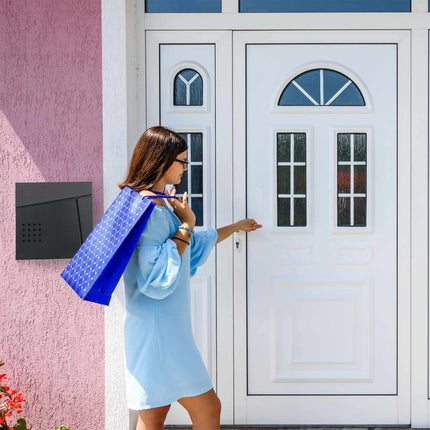 Black mailbox with newspaper holder