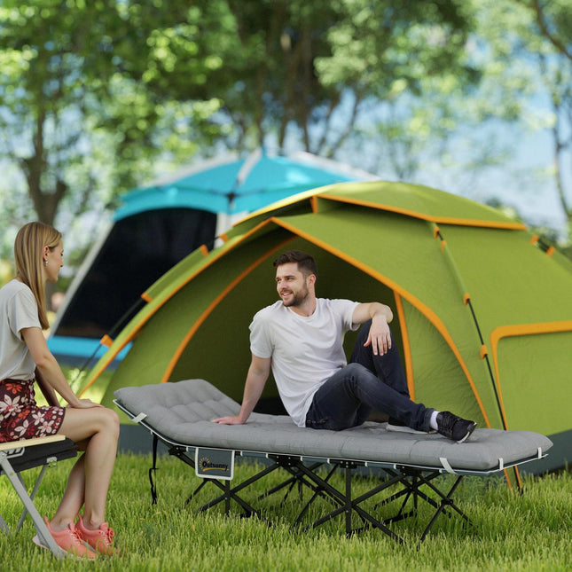 Light gray folding camping bed with mattress and pillow, 150 kg capacity