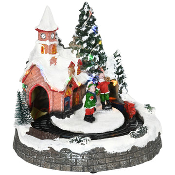 Christmas village with LED lights and moving train