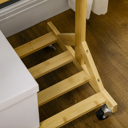 Bamboo clothes rack on wheels with shelf and hooks