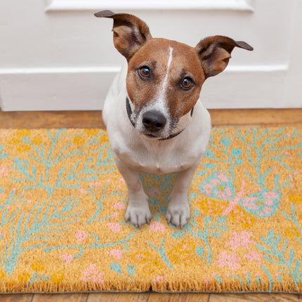Coconut fiber doormat with a spring-like motif