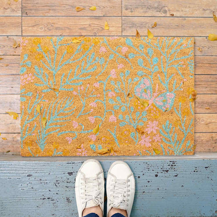 Coconut fiber doormat with a spring-like motif