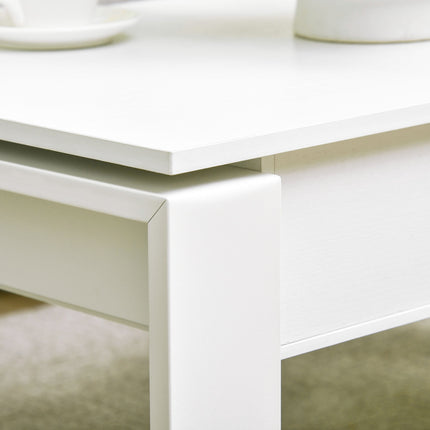 Height-adjustable white coffee table with hidden storage