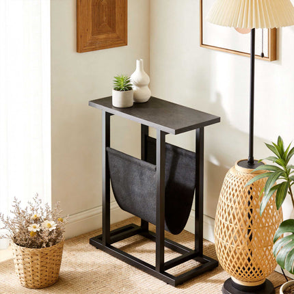 Compact Black Side Table with Steel Frame and Fabric Pocket