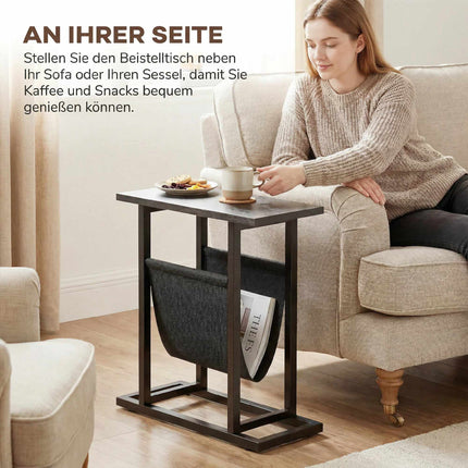Compact Black Side Table with Steel Frame and Fabric Pocket