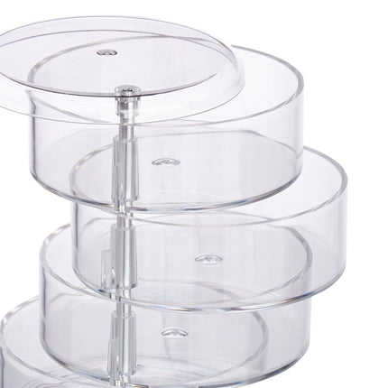 Cosmetic holder with rotating compartment