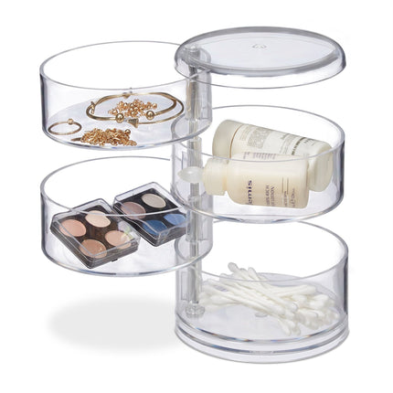 Cosmetic holder with rotating compartment