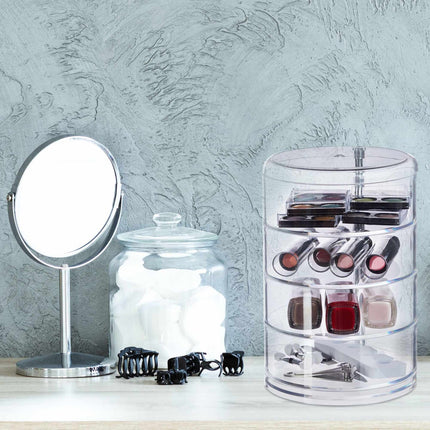 Cosmetic holder with rotating compartment