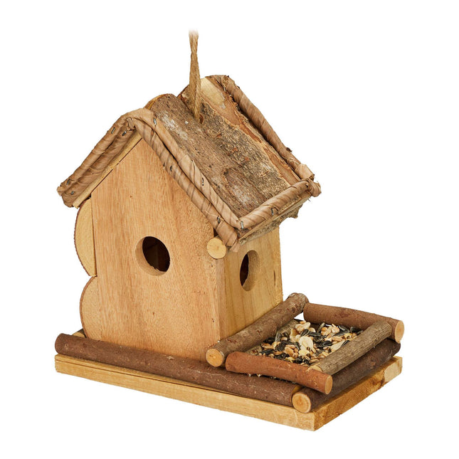 Decorative bird house with feeding station