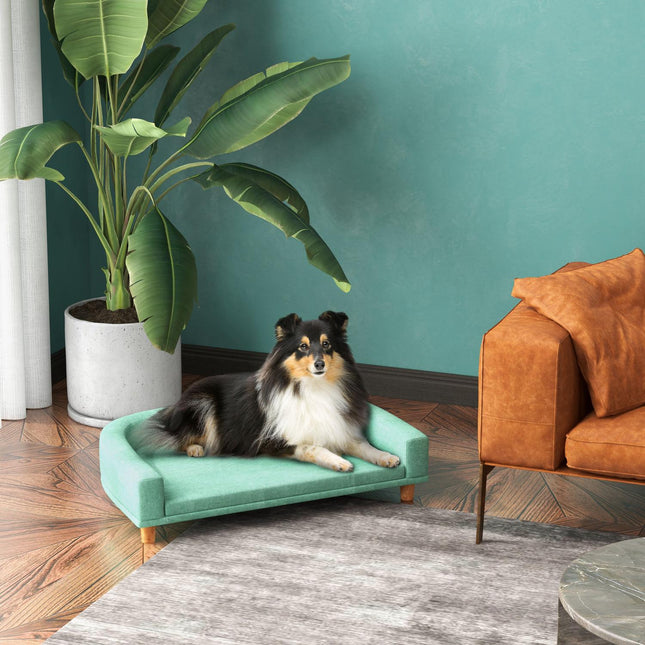 Comfortable pet sofa with cushion, elevated green design