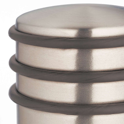 Door stop in stainless steel and bronze