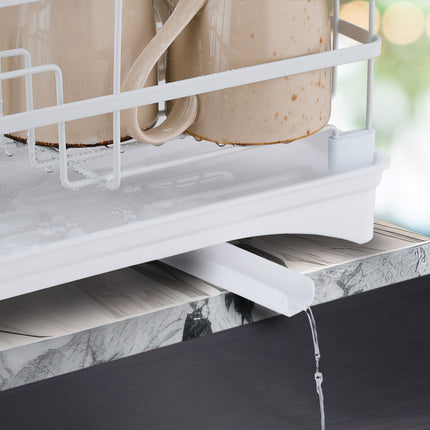 Drain stand with automatic drain