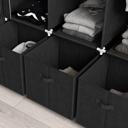 Black fabric wardrobe with rails and drawers