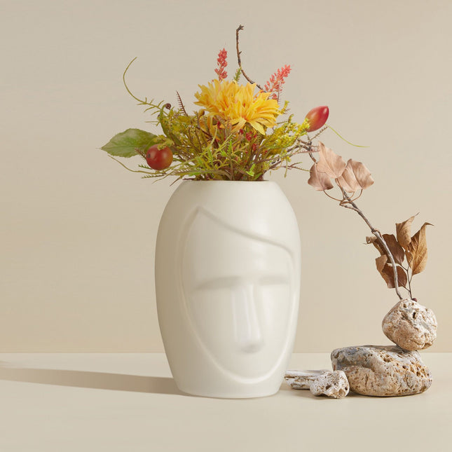 Face shaped flower vase