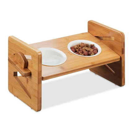 Feeding station for dogs adjustable in height