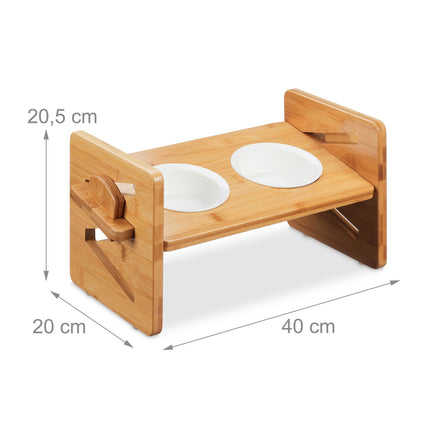 Feeding station for dogs adjustable in height