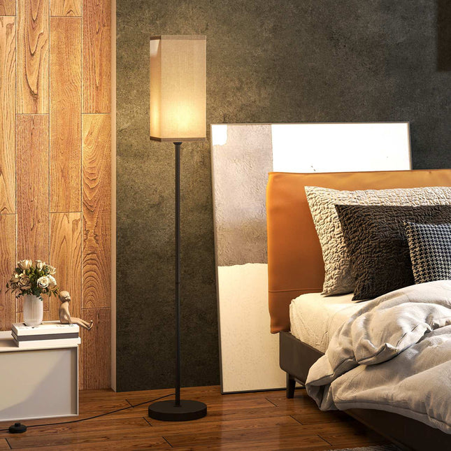 Modern black floor lamp with linen-look shade, foot switch