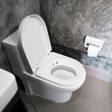 Foldable sitz bath for the toilet