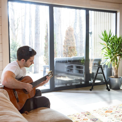 Folding guitar stand