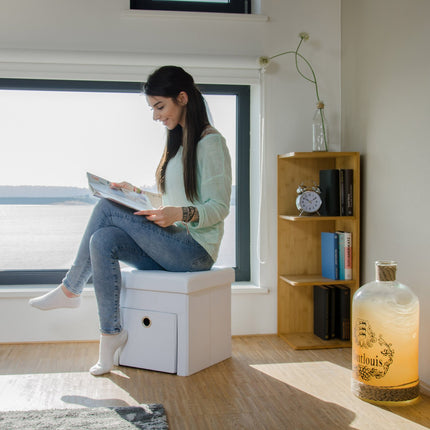 Folding stool in linen with compartment