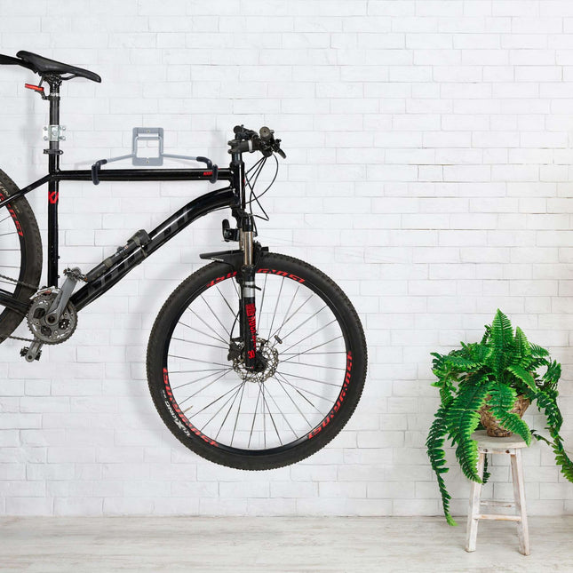 Folding wall bracket for bicycle