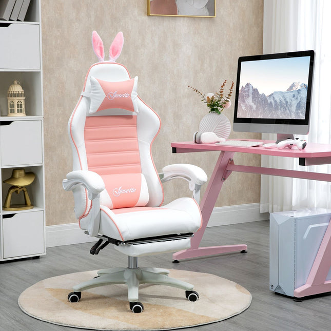 Pink ergonomic gaming chair with lumbar support and footrest