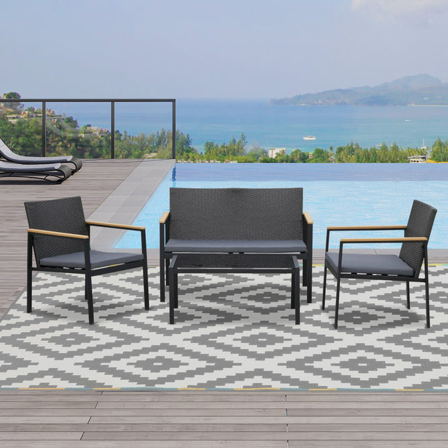 4-piece black rattan patio set with cushions
