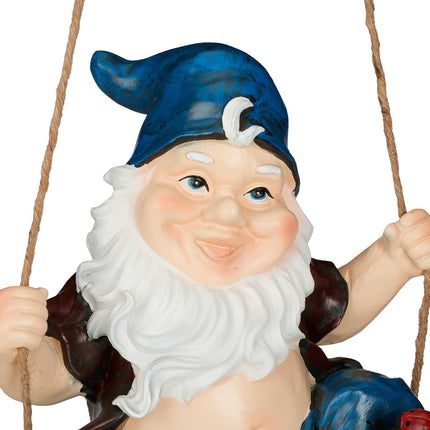 Garden gnome on a swing
