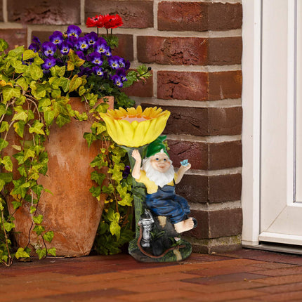 Garden gnome with bird bath