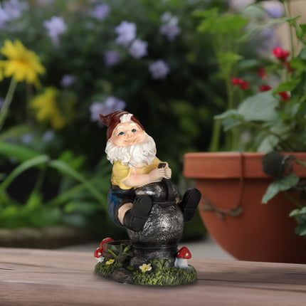 Garden gnome with lantern