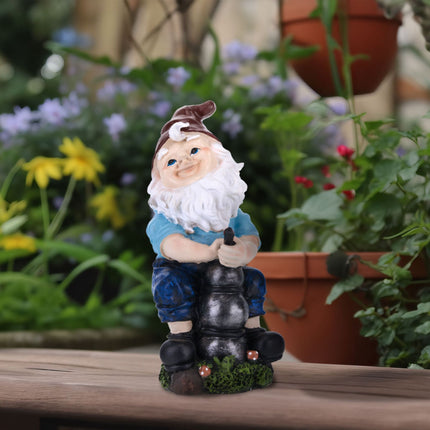 Garden gnome with water pump