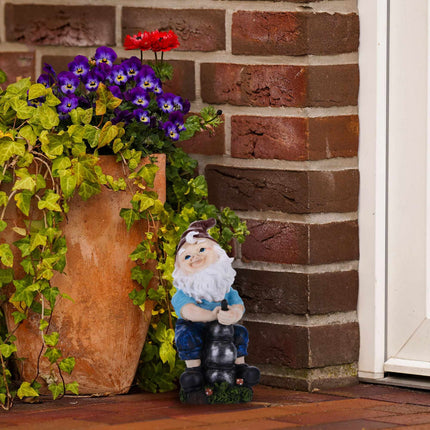 Garden gnome with water pump
