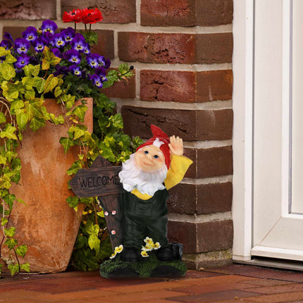 Garden gnome with welcome sign