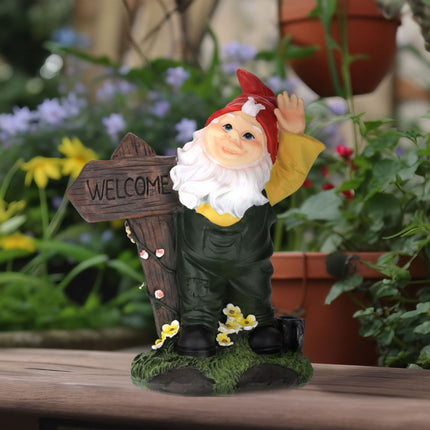 Garden gnome with welcome sign