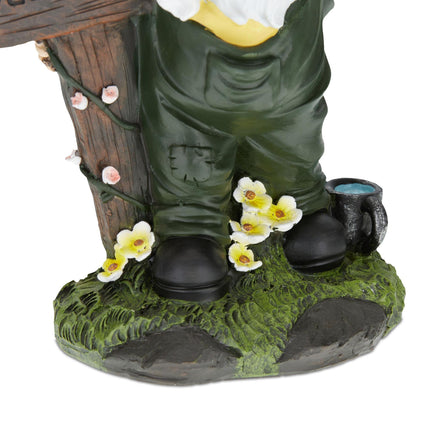 Garden gnome with welcome sign