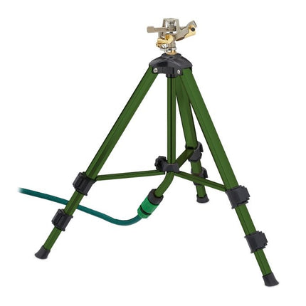 Green sprinkler with metal stand