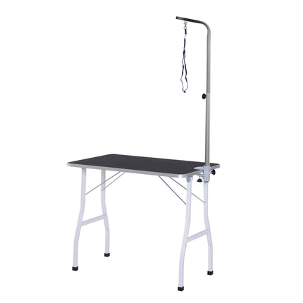 Adjustable dog grooming table with slings for bathing