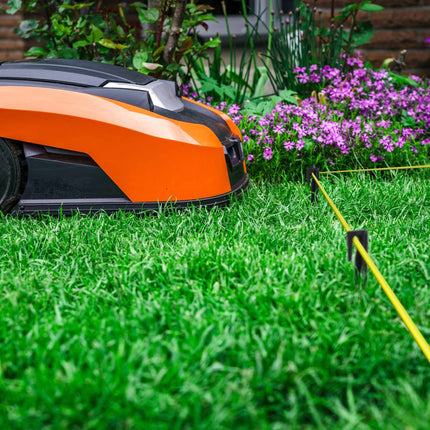 Ground hook for robotic lawnmower boundary cable